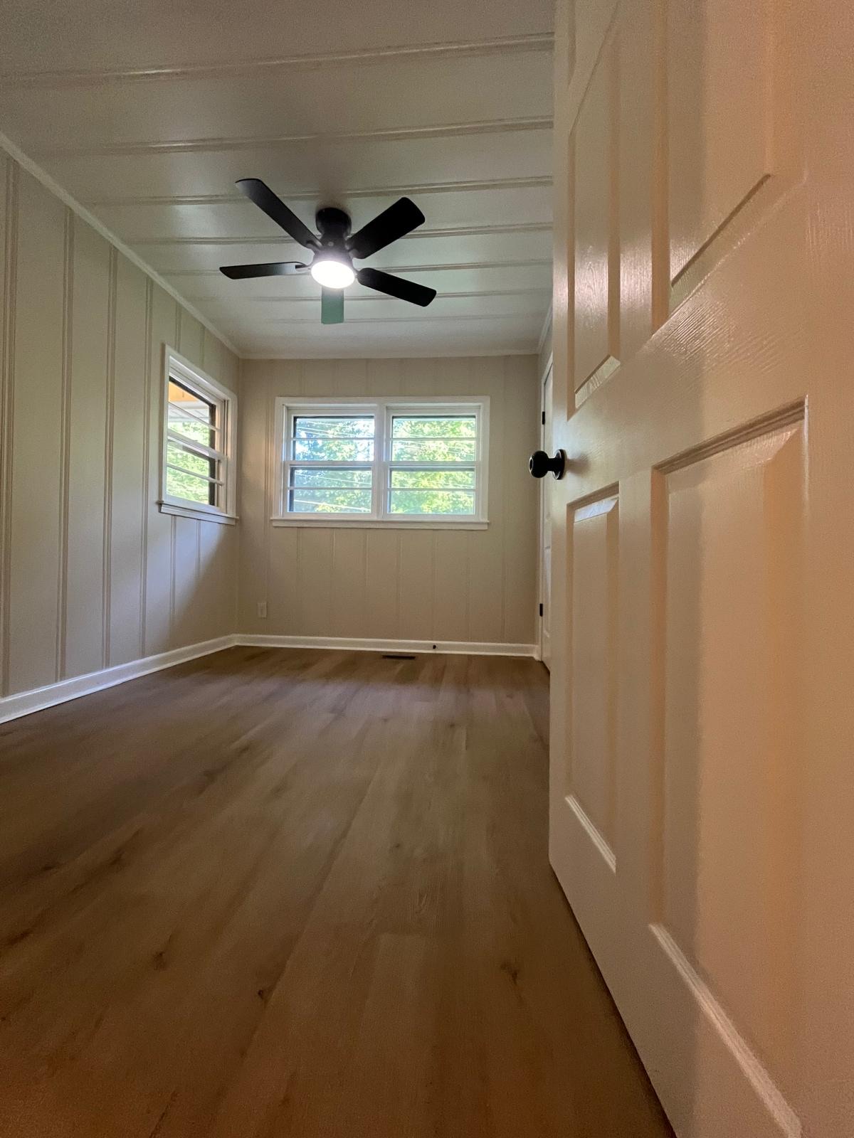 Bedroom with fresh plank flooring